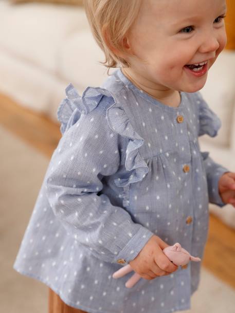 Blusa con volante para bebé niña